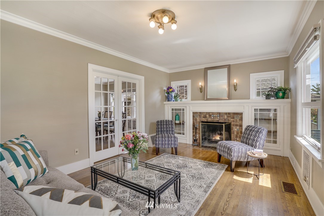 548 North 68th Street Seattle, WA 98103 - Photo 12 of 20 a living room with furniture and a fireplace