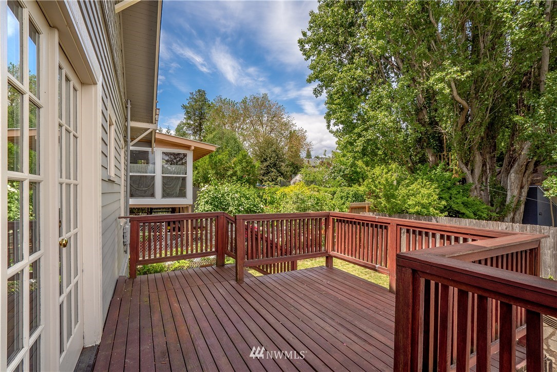 548 North 68th Street Seattle, WA 98103 - Photo 18 of 20 a view of a wooden deck