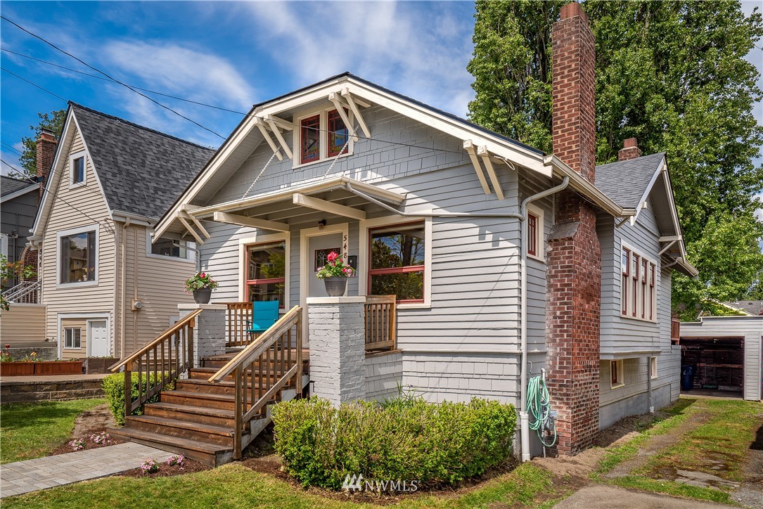 548 North 68th Street Seattle, WA 98103 - Photo 20 of 20 a front view of a house with a yard