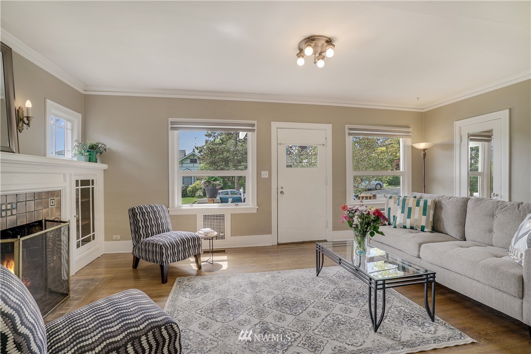 548 North 68th Street Seattle, WA 98103 - Photo 3 of 20 a living room with furniture and a fireplace