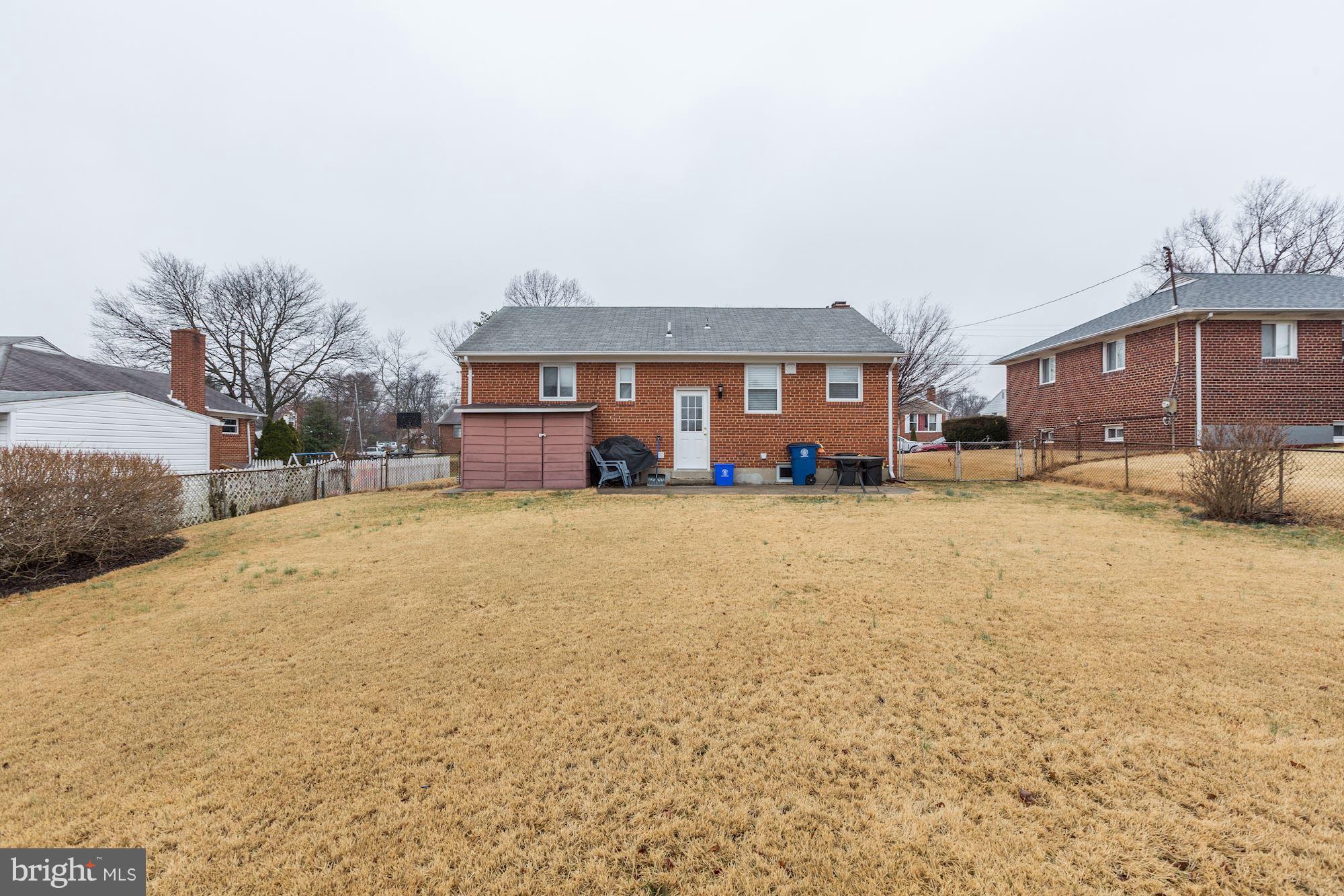 12503 Feldon Street Silver Spring, MD 20906 - Photo 2 of 18 a front view of a house with a yard
