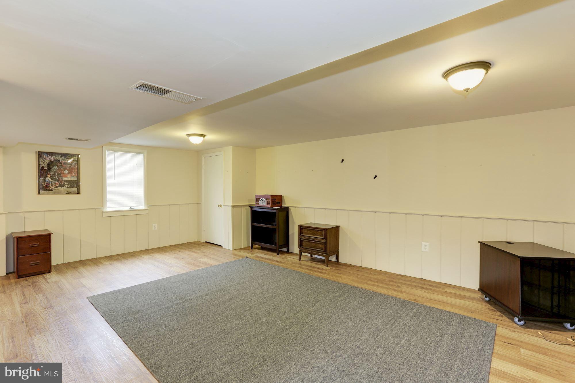 12503 Feldon Street Silver Spring, MD 20906 - Photo 13 of 18 a view of a livingroom with a fireplace