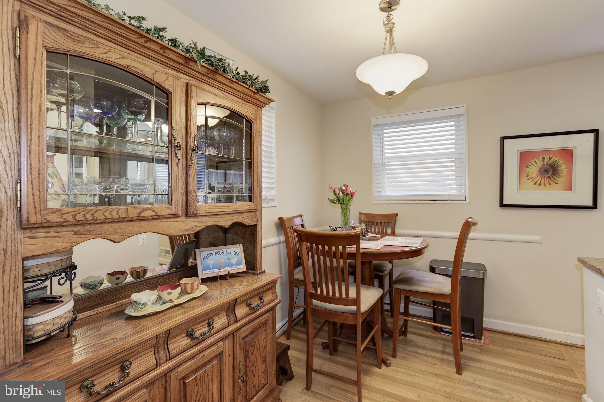 12503 Feldon Street Silver Spring, MD 20906 - Photo 6 of 18 a dining room with furniture and window