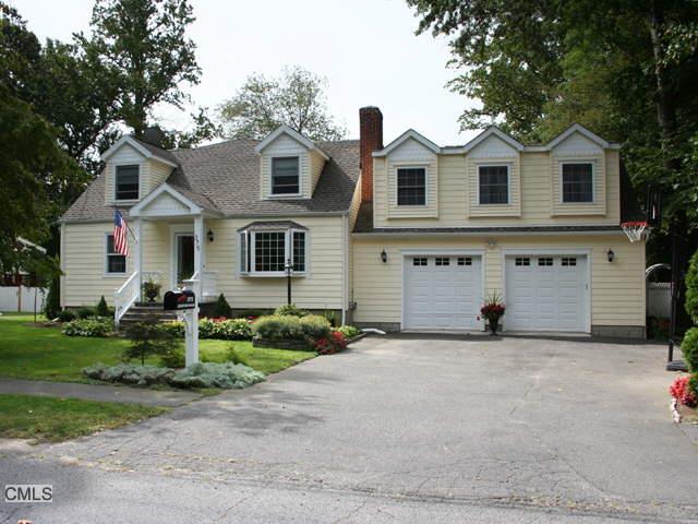 375 Jeniford Road Fairfield, CT 06824 - Photo 1 of 1 a view of a white house with a yard and plants