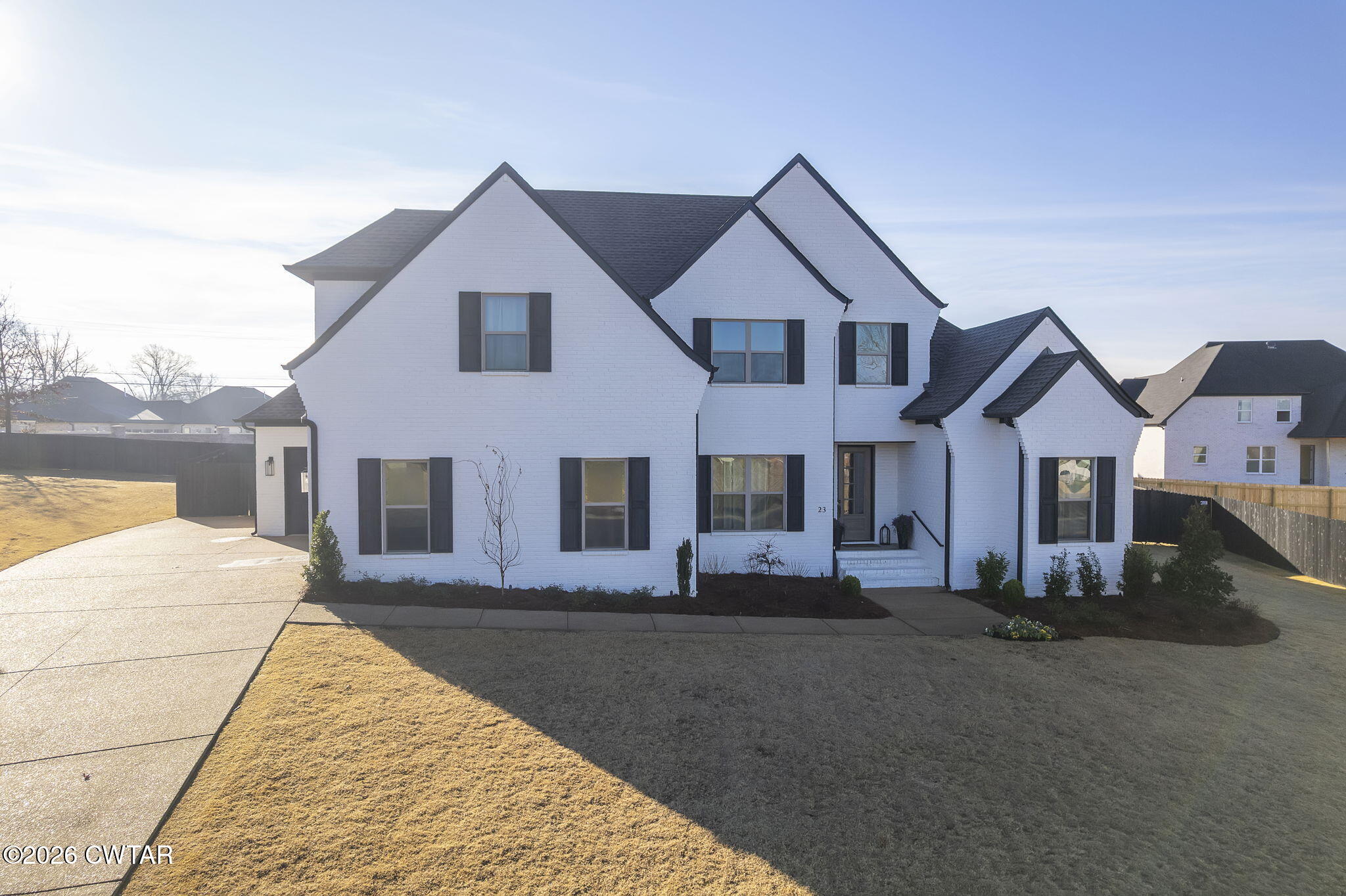23 Clearwater Cove Jackson, TN 38305 - Photo 1 of 60 a front view of a house with a yard