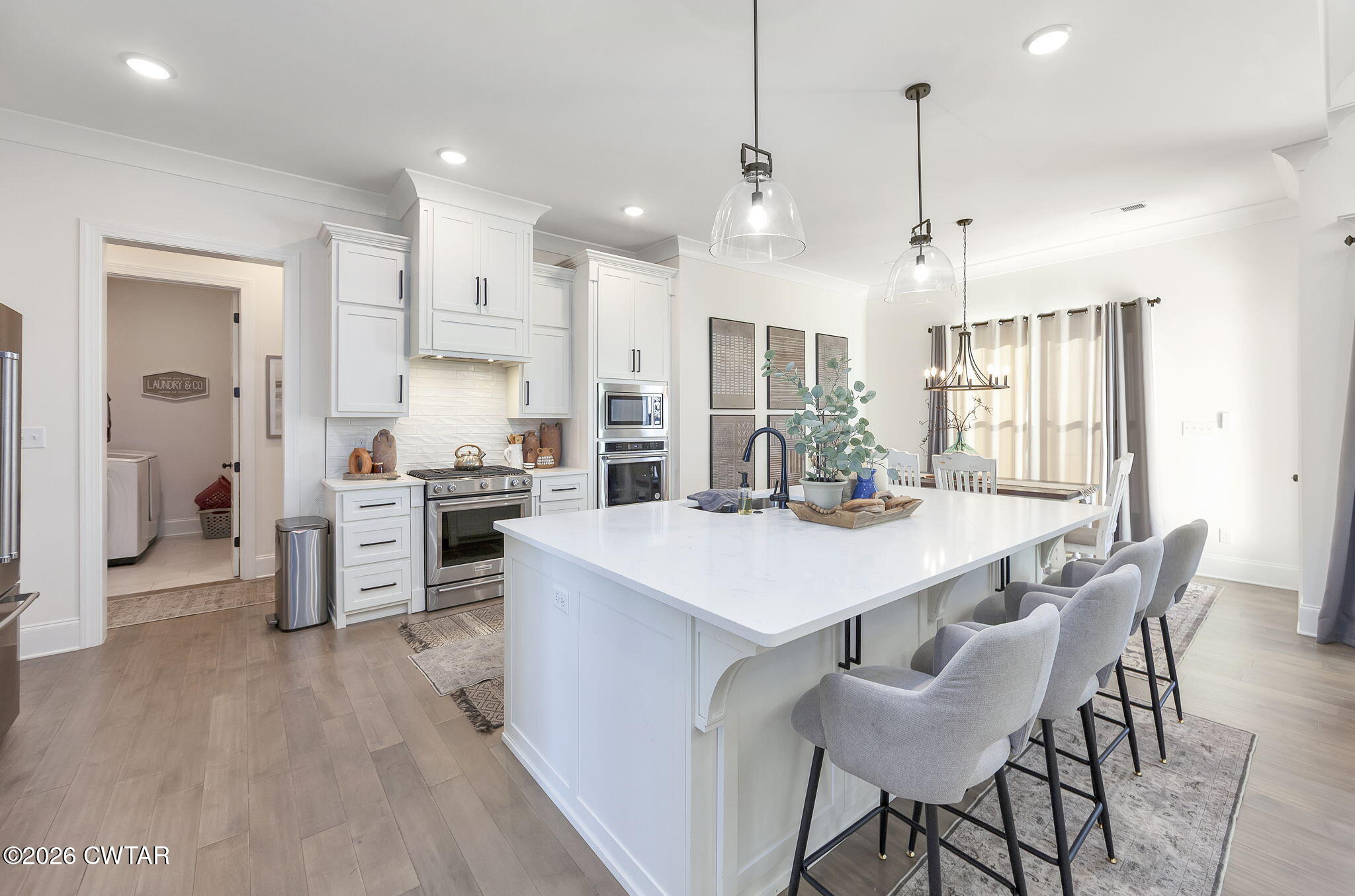 23 Clearwater Cove Jackson, TN 38305 - Photo 13 of 60 a large kitchen with a table and chairs