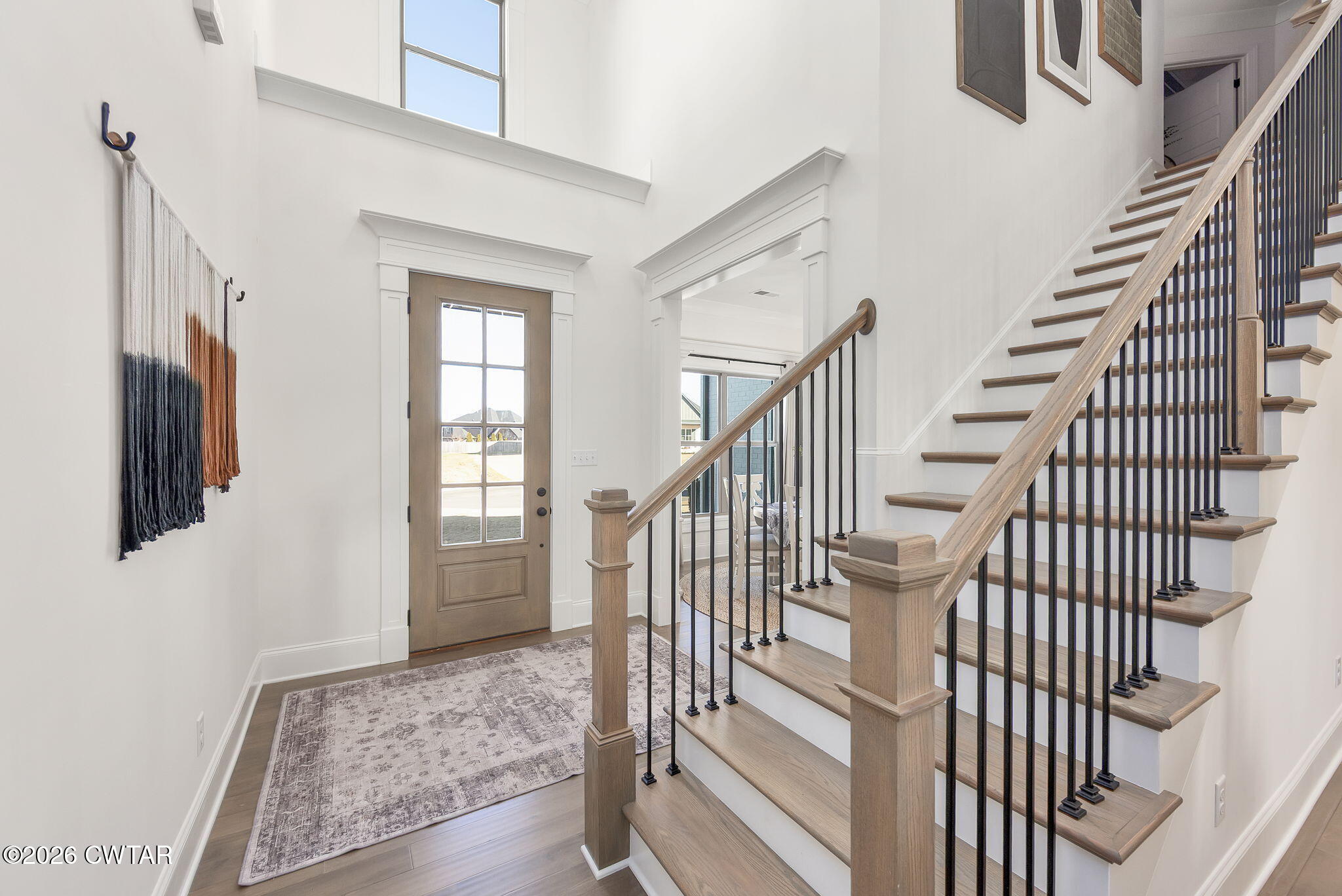 23 Clearwater Cove Jackson, TN 38305 - Photo 2 of 60 a view of staircase with wooden floor and staircase