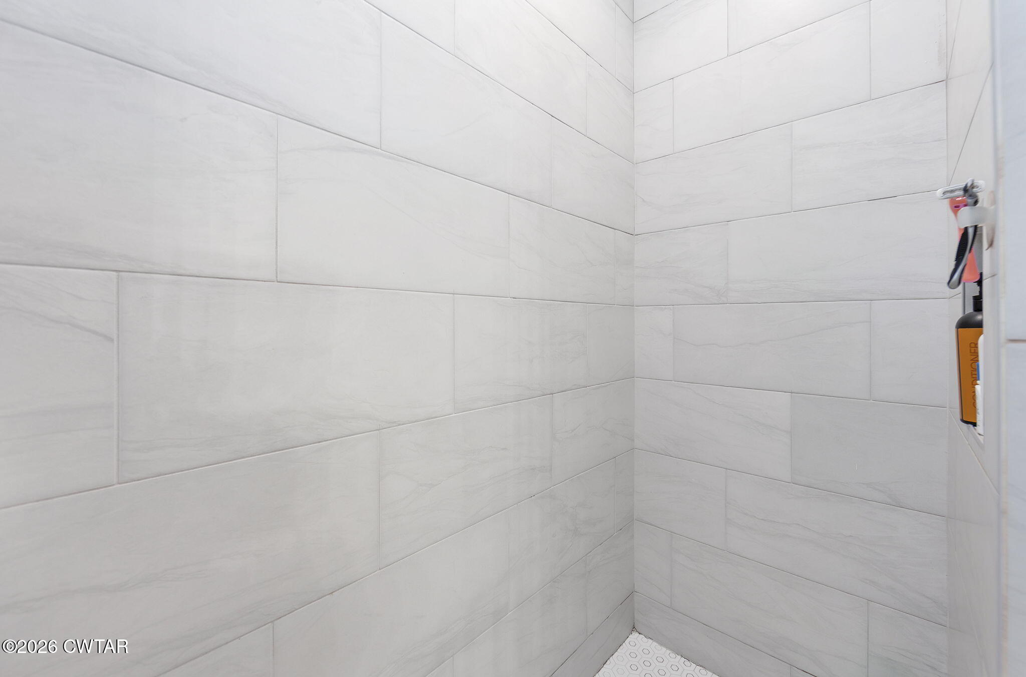 23 Clearwater Cove Jackson, TN 38305 - Photo 23 of 60 a bathroom with a white shower