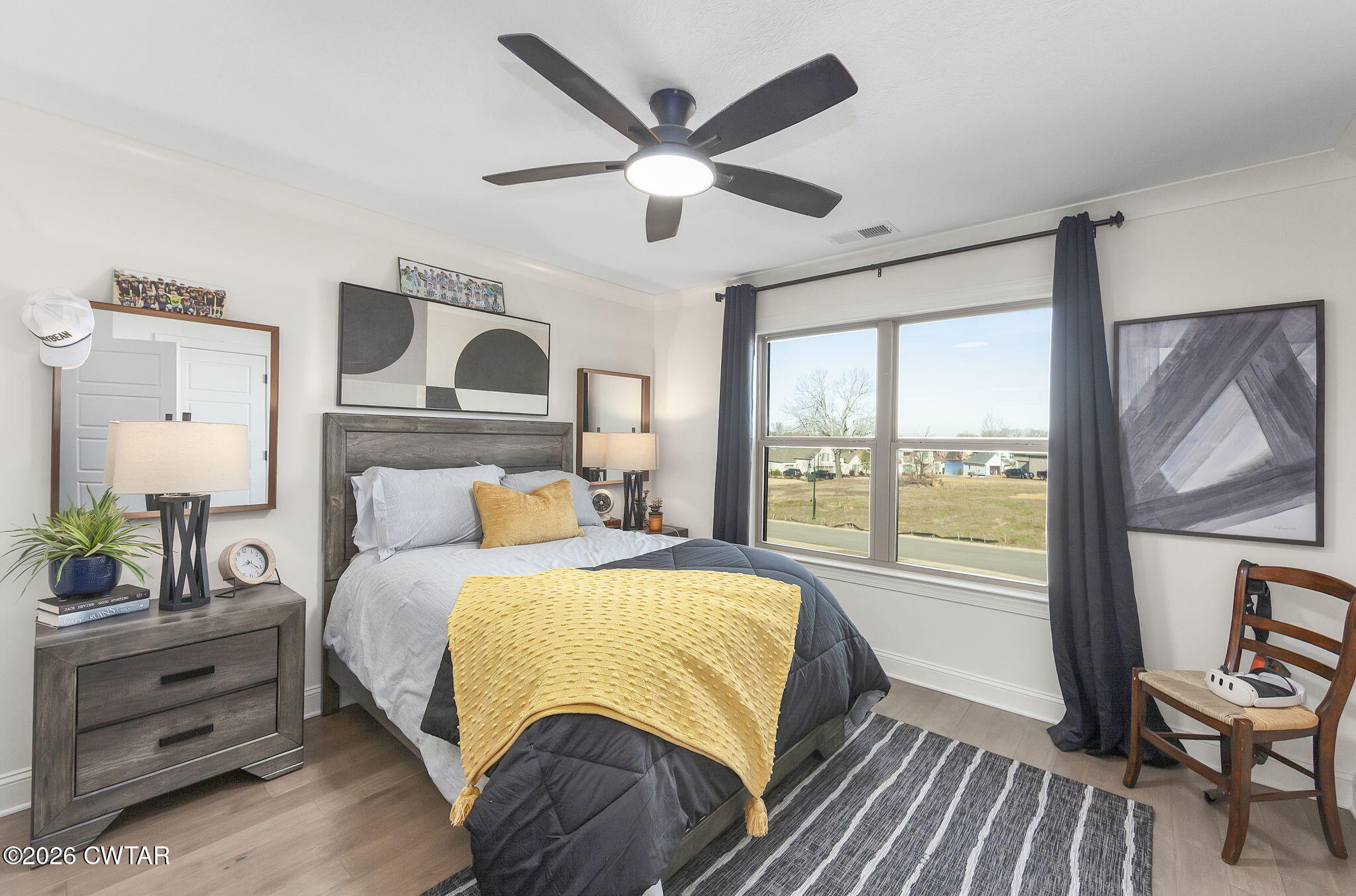 23 Clearwater Cove Jackson, TN 38305 - Photo 24 of 60 a bedroom with a bed and a large window with the outer view