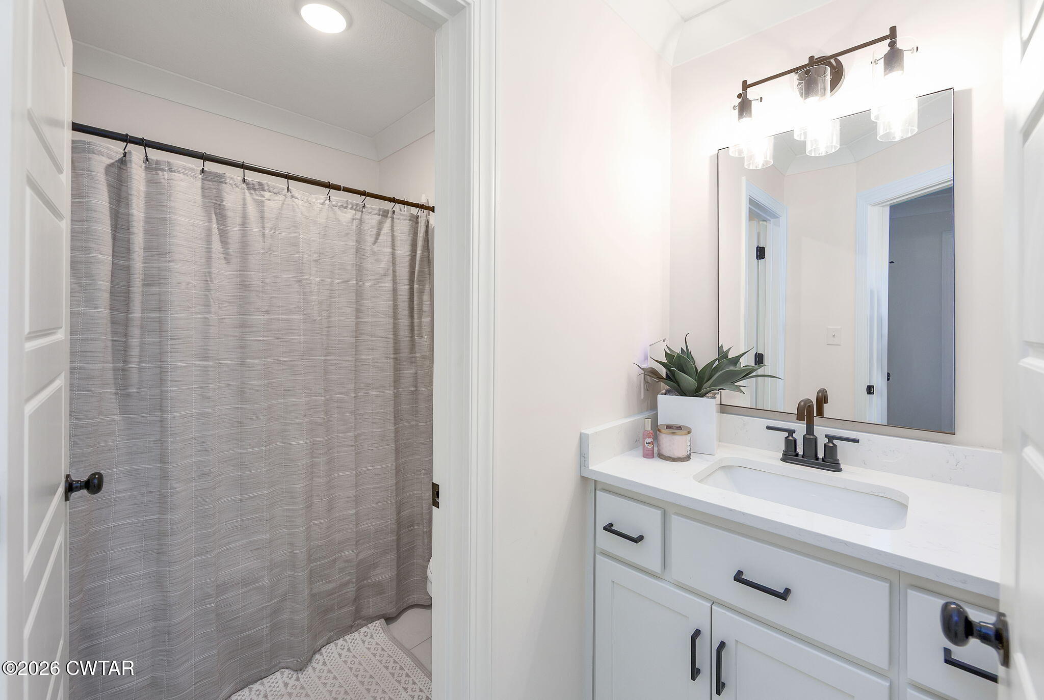 23 Clearwater Cove Jackson, TN 38305 - Photo 25 of 60 a bathroom with a sink and a mirror