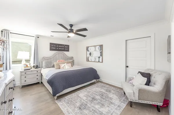 a bathroom with a sink vanity and a mirror