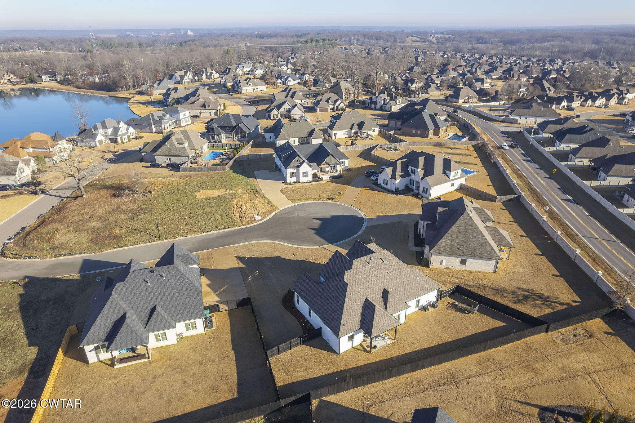 23 Clearwater Cove Jackson, TN 38305 - Photo 34 of 60 an aerial view of residential houses with outdoor space