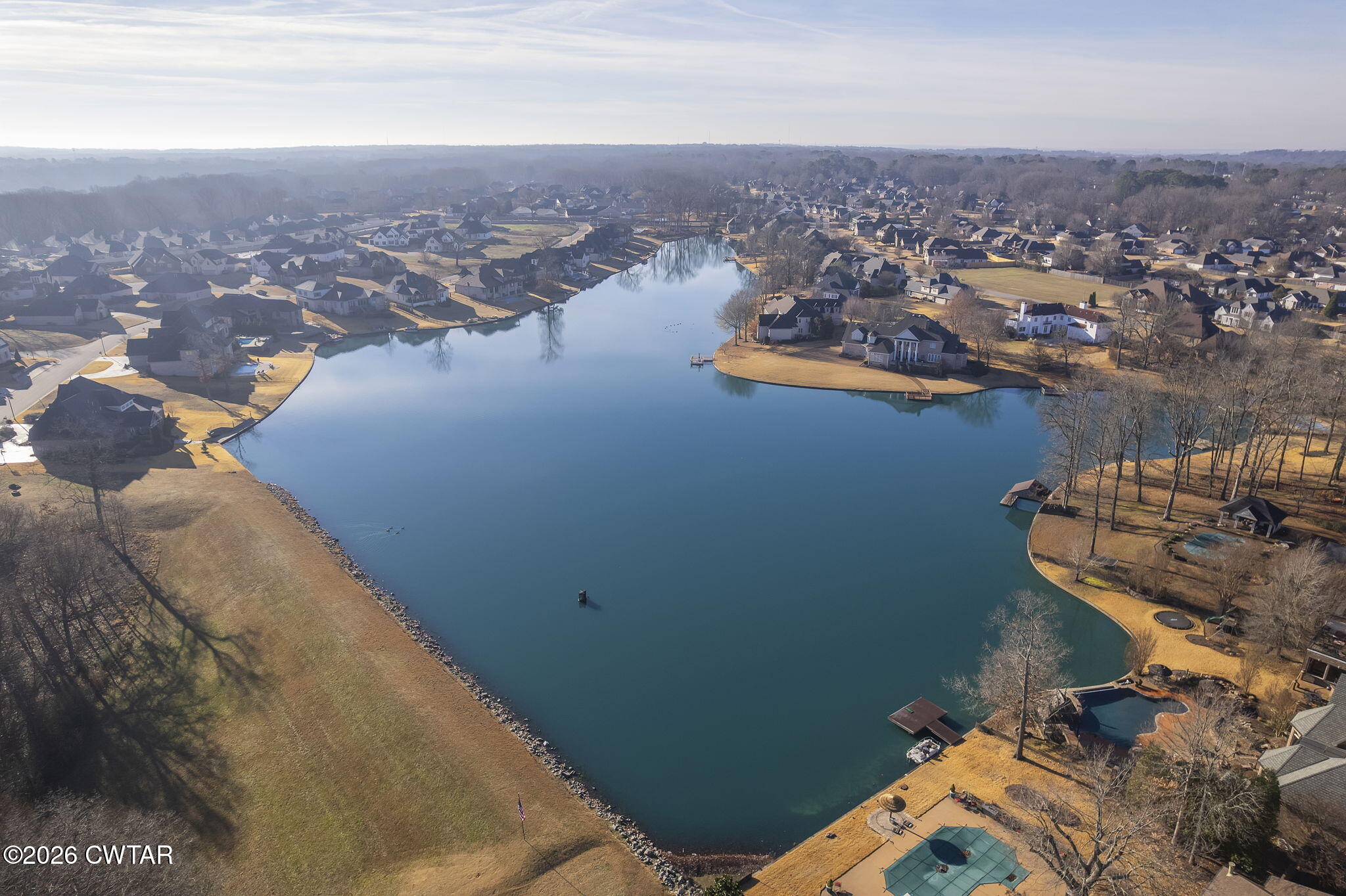 23 Clearwater Cove Jackson, TN 38305 - Photo 39 of 60 an aerial view of a house with a lake view