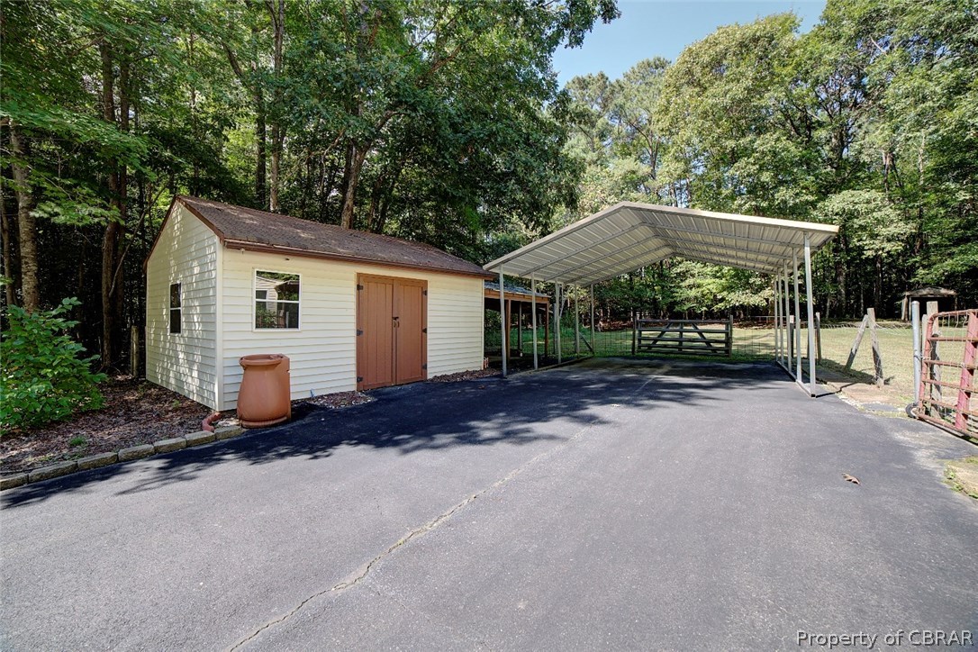 10422 Figg Shop Road Gloucester, VA 23061 - Photo 24 of 33 Storage Shed and Carport