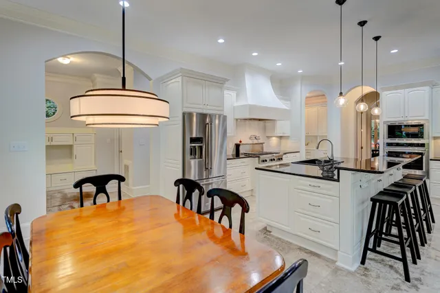 a view of balcony with wooden floor and fence