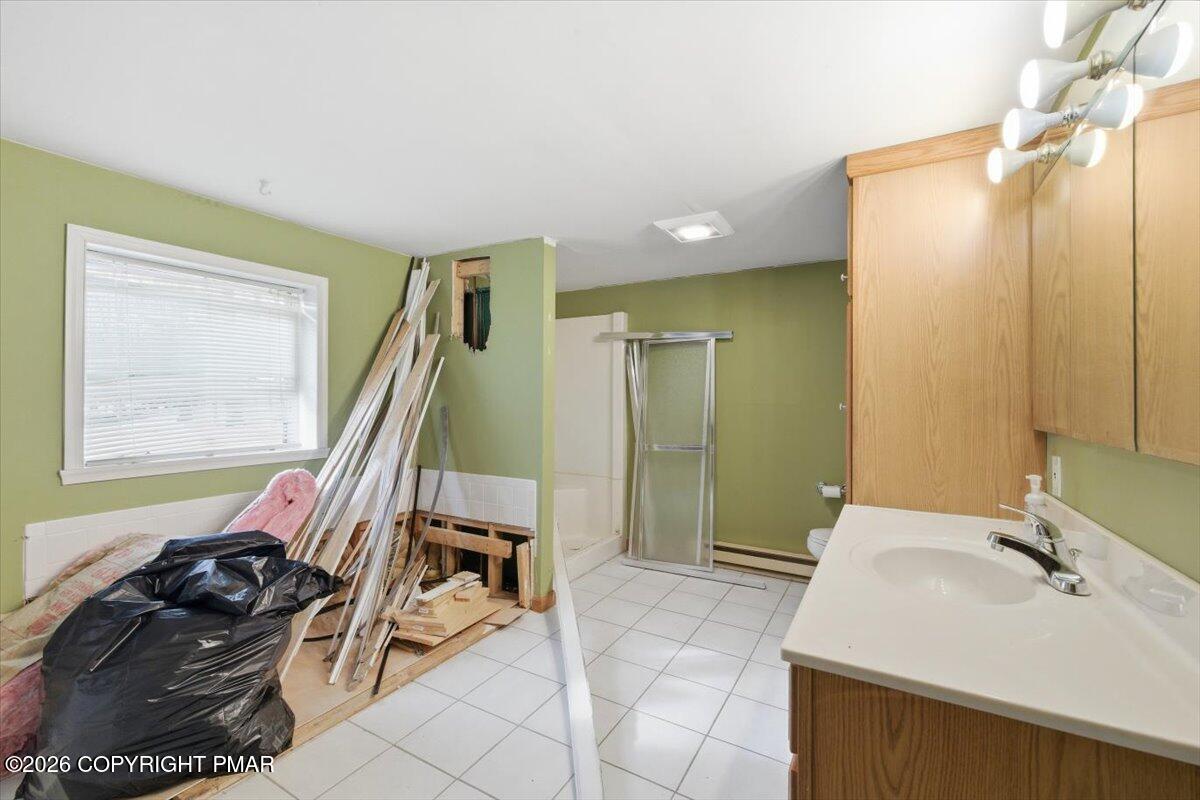 3529 Winding Way Kunkletown, PA 18058 - Photo 17 of 37 a bathroom with a sink and a mirror