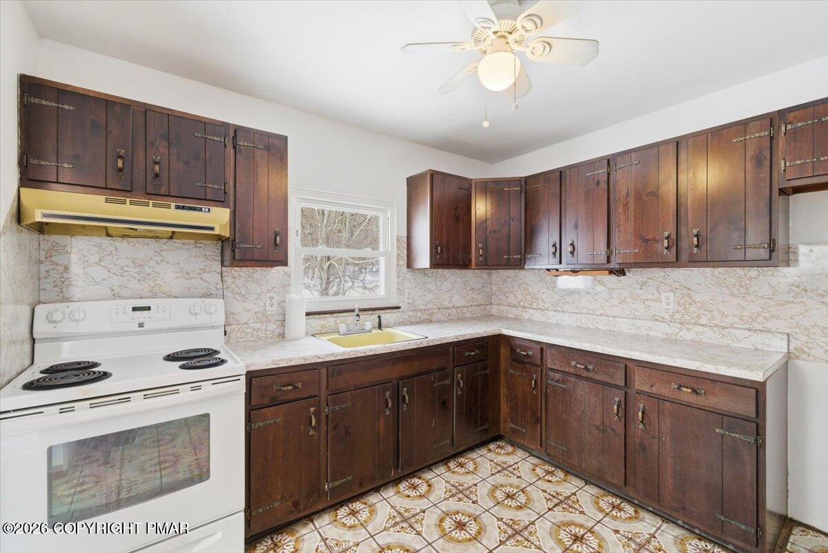 3529 Winding Way Kunkletown, PA 18058 - Photo 26 of 37 a kitchen with a sink cabinets and stainless steel appliances