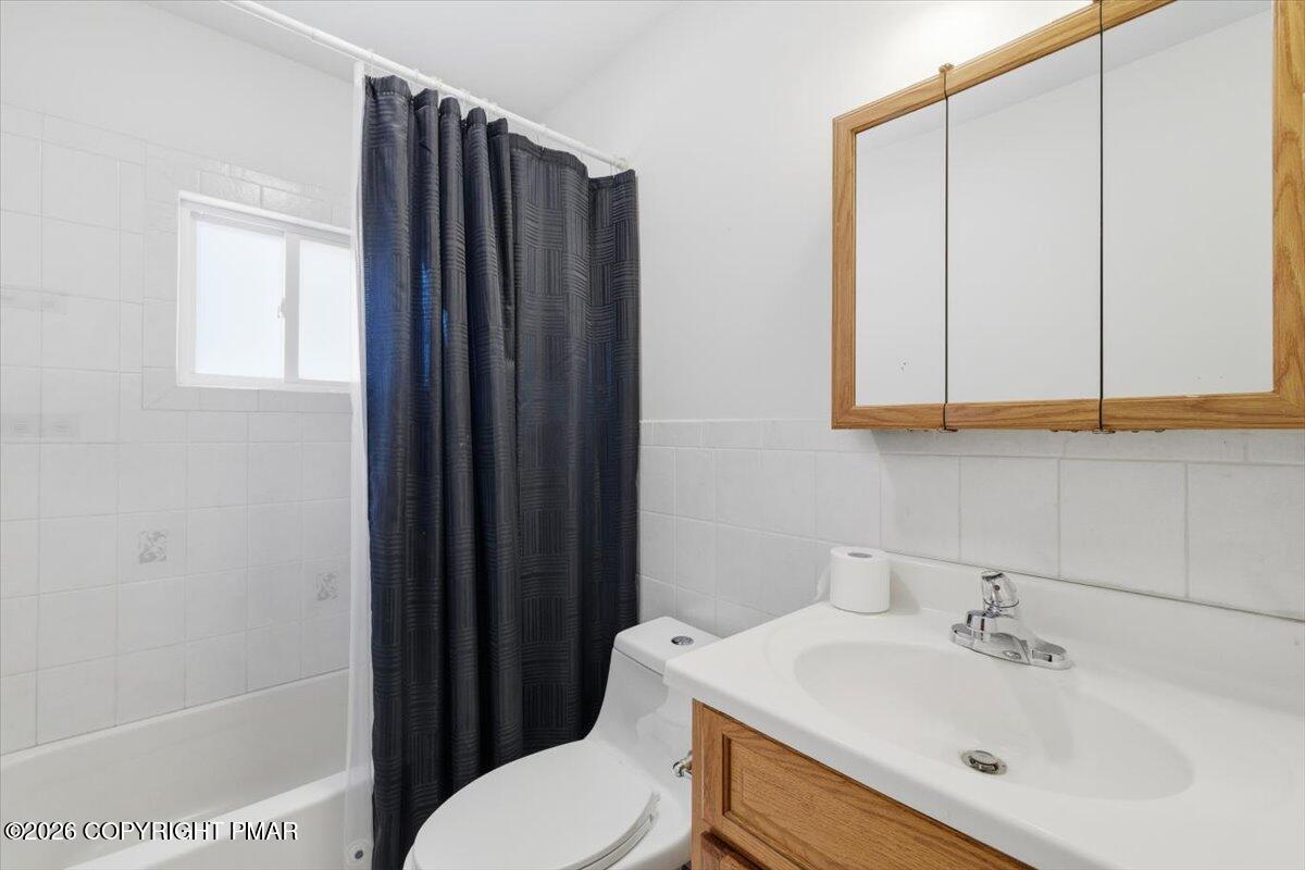 3529 Winding Way Kunkletown, PA 18058 - Photo 31 of 37 a bathroom with a sink a toilet and shower