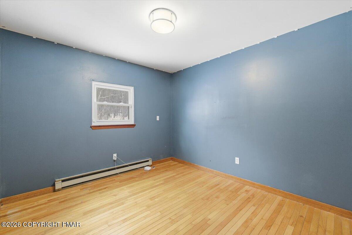 3529 Winding Way Kunkletown, PA 18058 - Photo 32 of 37 a view of a big room with wooden floor and a window
