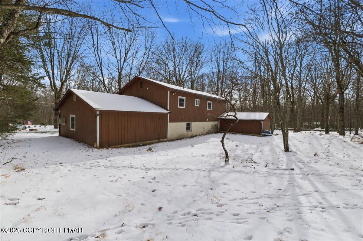 3529 Winding Way Kunkletown, PA 18058 - Photo 6 of 37 a backyard of a house with wooden fence