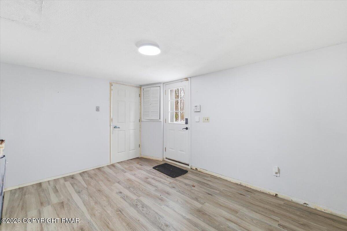 3529 Winding Way Kunkletown, PA 18058 - Photo 7 of 37 a view of an empty room and wooden floor