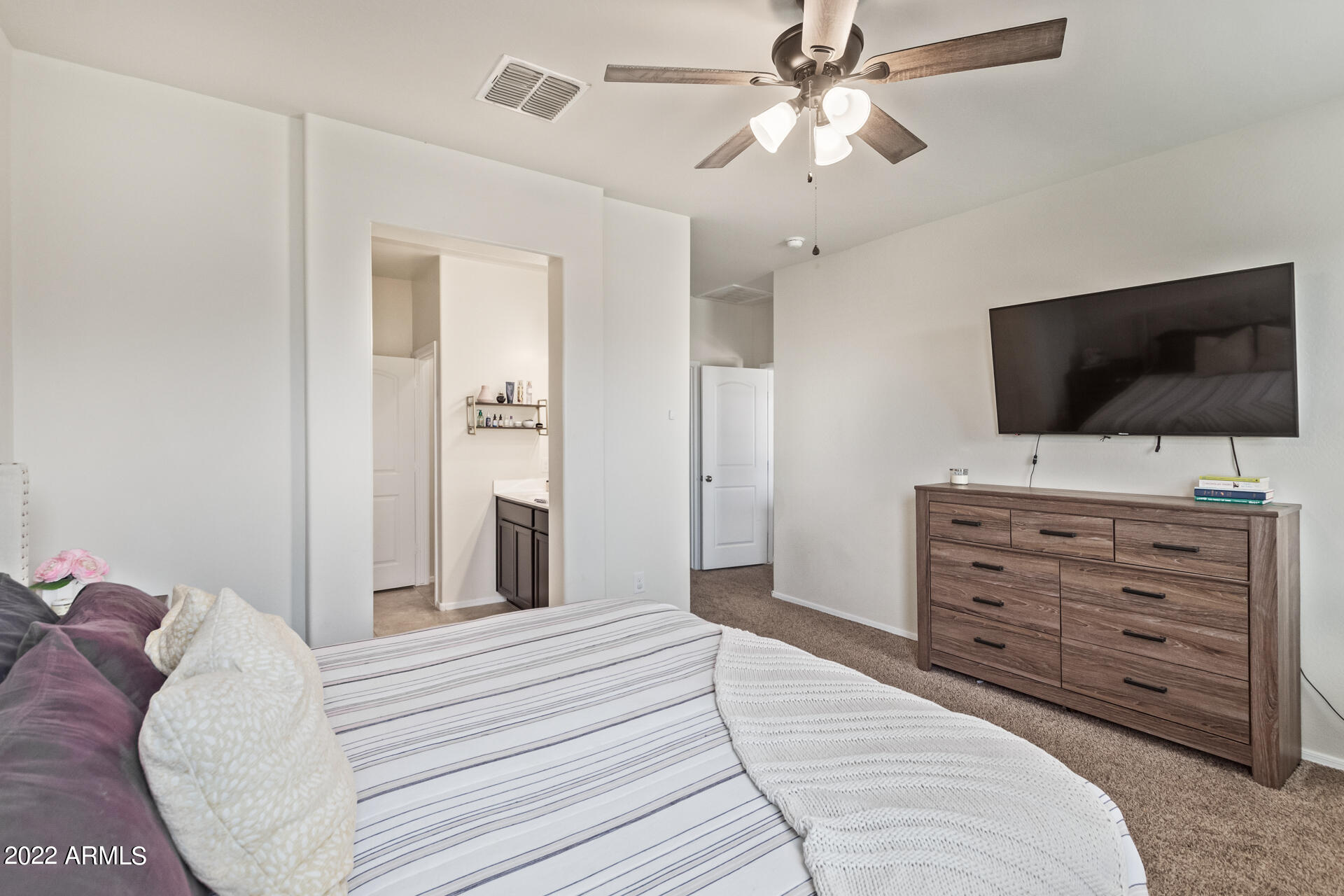 31031 West Osborn Road Buckeye, AZ 85396 - Photo 42 of 42 Primary bedroom, split floorplan