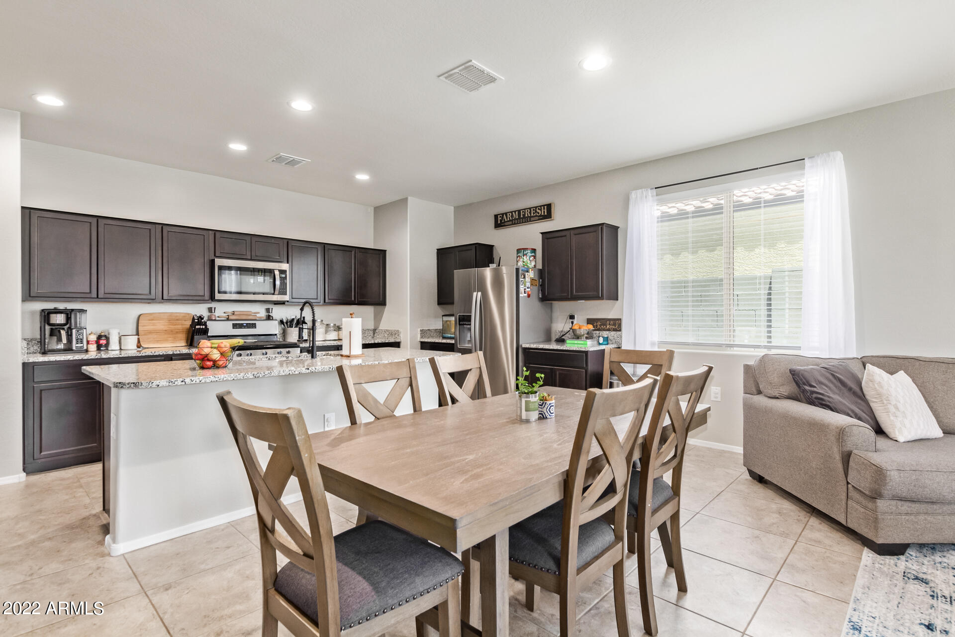 31031 West Osborn Road Buckeye, AZ 85396 - Photo 10 of 42 Dining area overlooking the kitchen