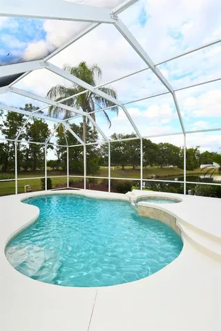 a view of a lake with a yard