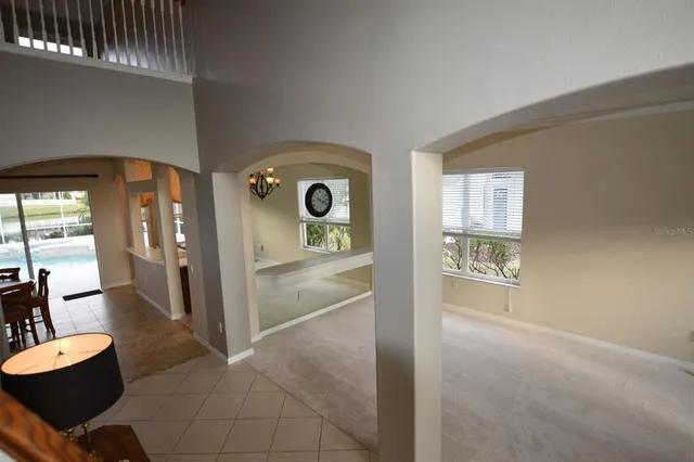 a view of livingroom with furniture and windows