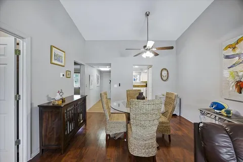 a living room with furniture rug and window