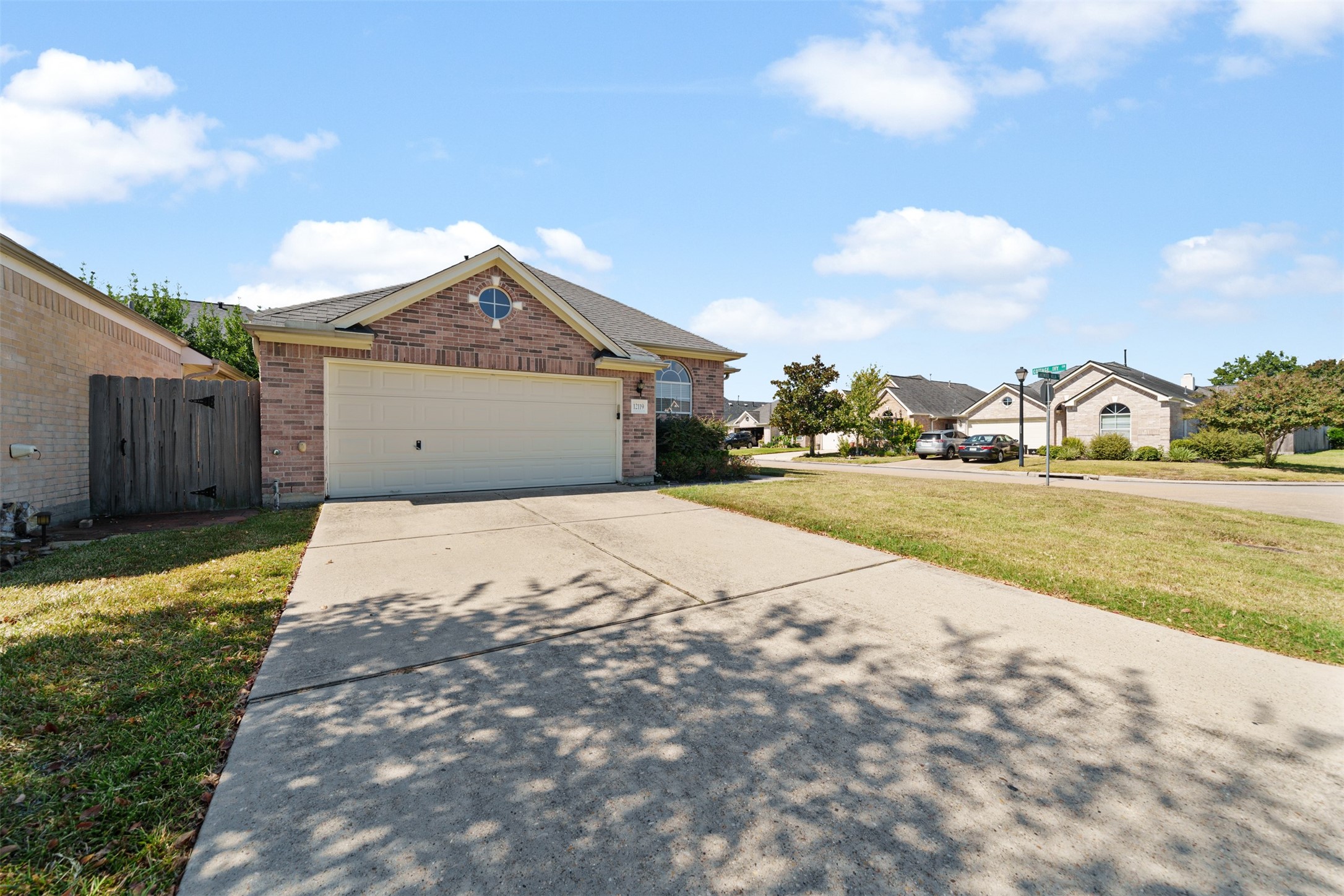 12119 Lakewood Villa Drive Tomball, TX 77377 - Photo 1 of 19 a view of a house with a yard