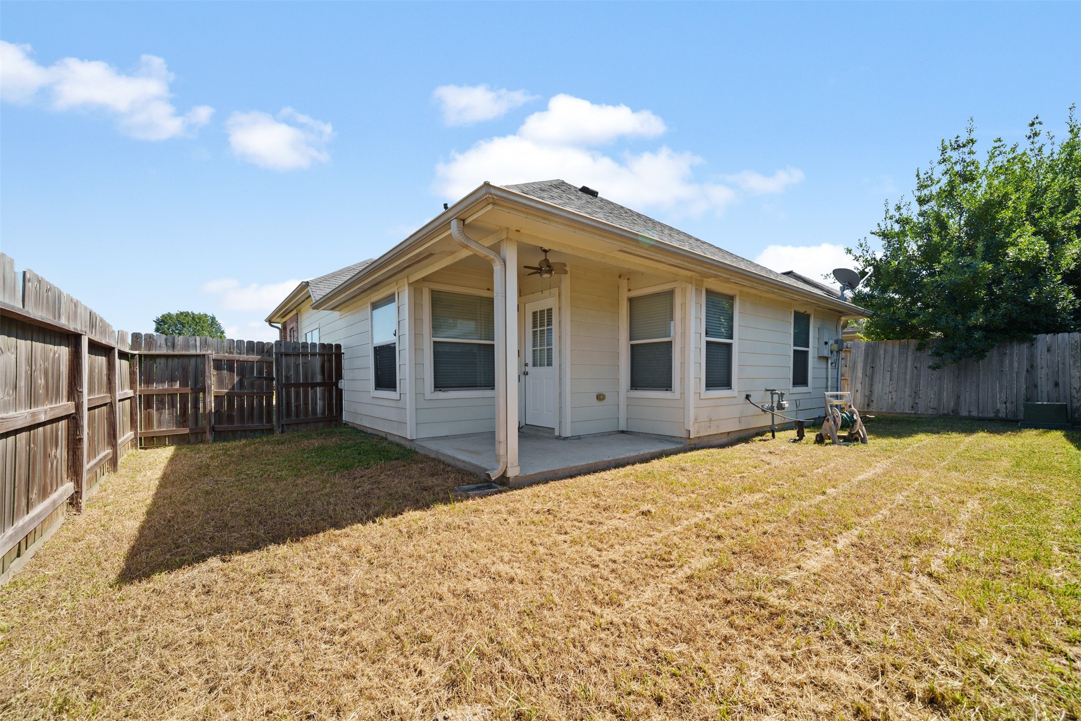 12119 Lakewood Villa Drive Tomball, TX 77377 - Photo 19 of 19 a front view of a house with a yard