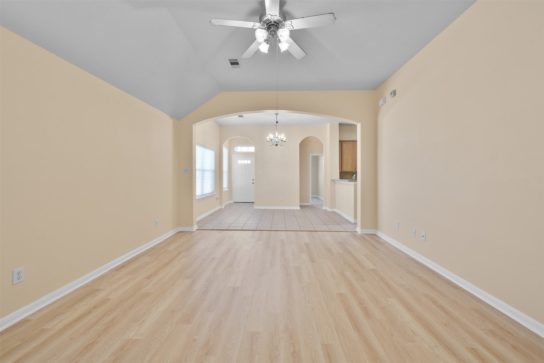 12119 Lakewood Villa Drive Tomball, TX 77377 - Photo 8 of 19 an empty room with wooden floor and windows