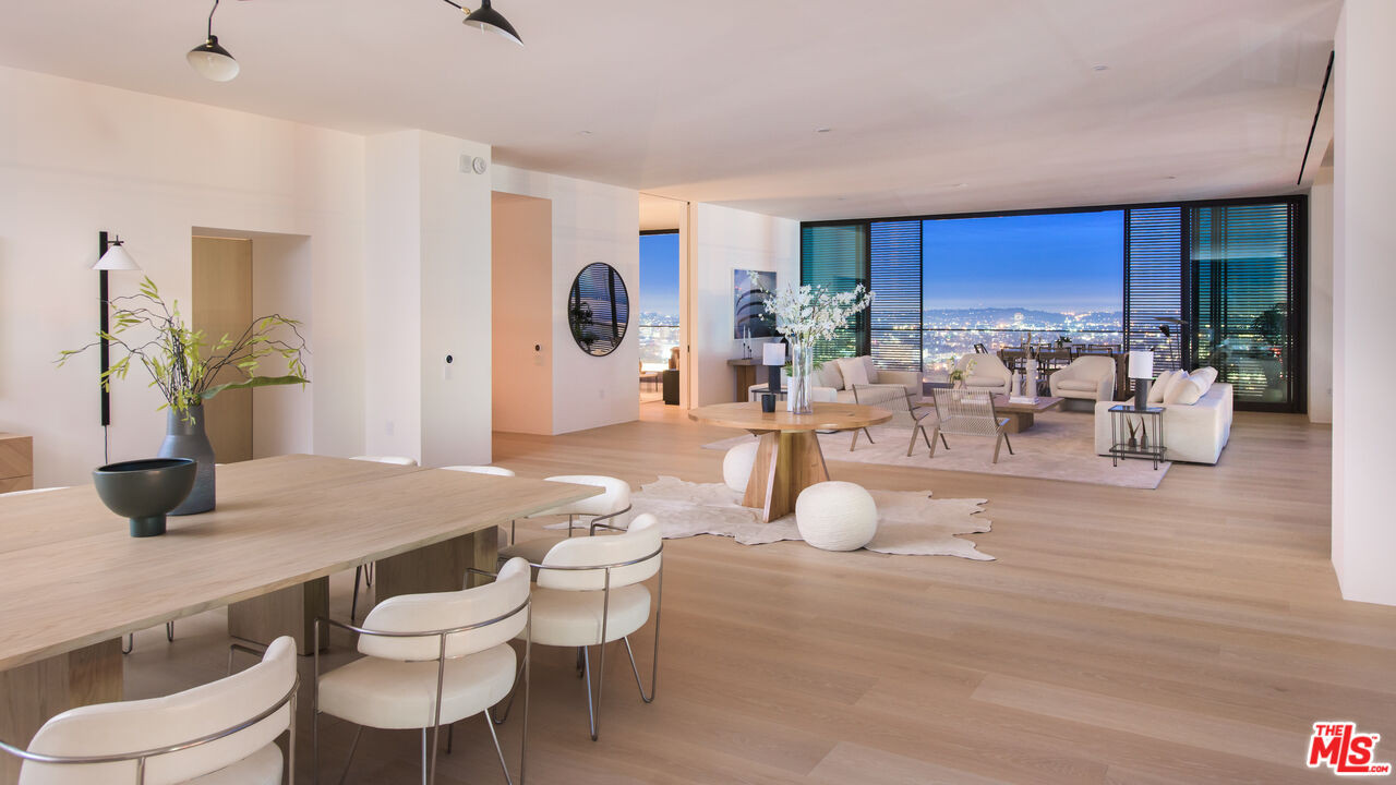 9040 Sunset Boulevard, Unit PHA West Hollywood, CA 90069 - Photo 1 of 30 a dining room with furniture and wooden floor