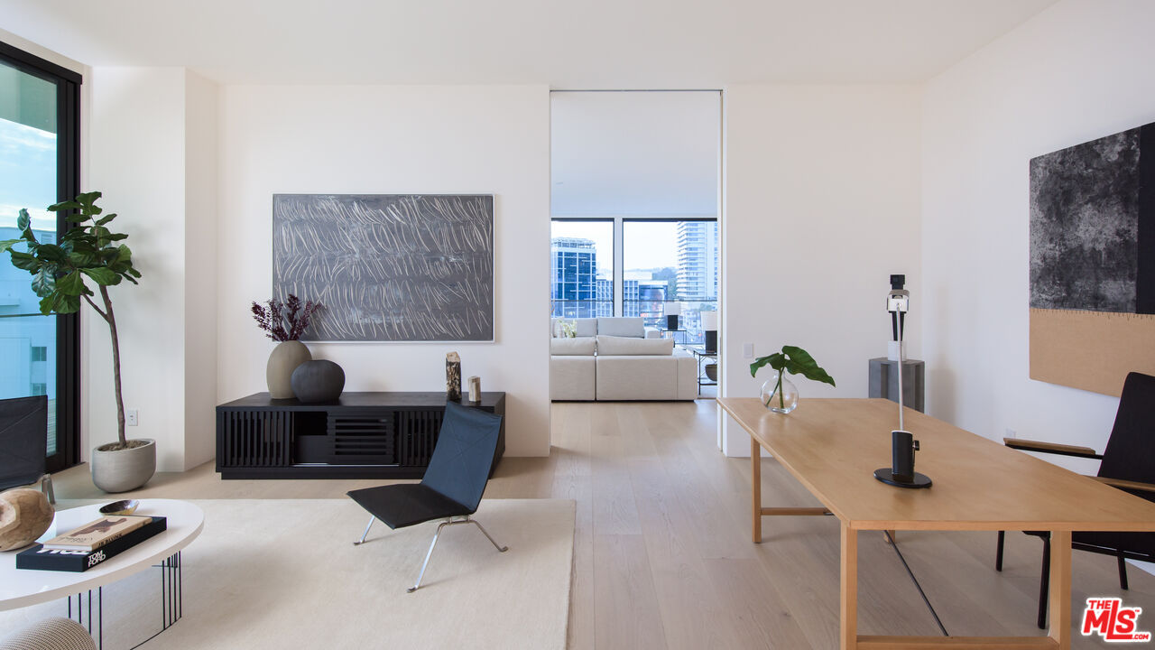 9040 Sunset Boulevard, Unit PHA West Hollywood, CA 90069 - Photo 13 of 30 a living room with furniture and a potted plant