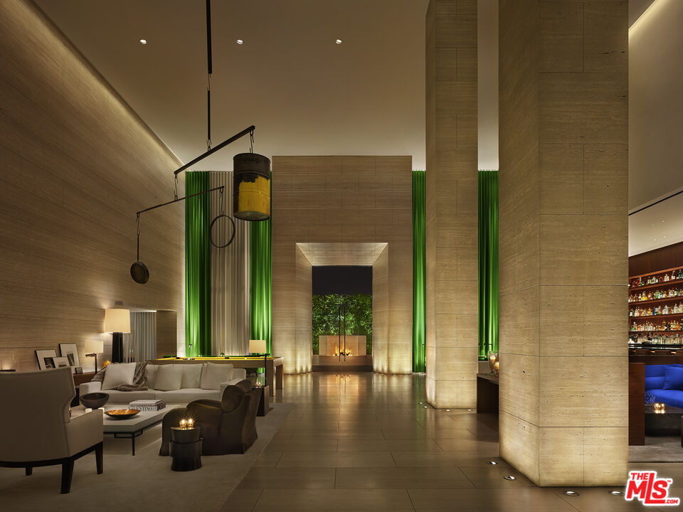 9040 Sunset Boulevard, Unit PHA West Hollywood, CA 90069 - Photo 29 of 30 a living room with furniture and a fireplace