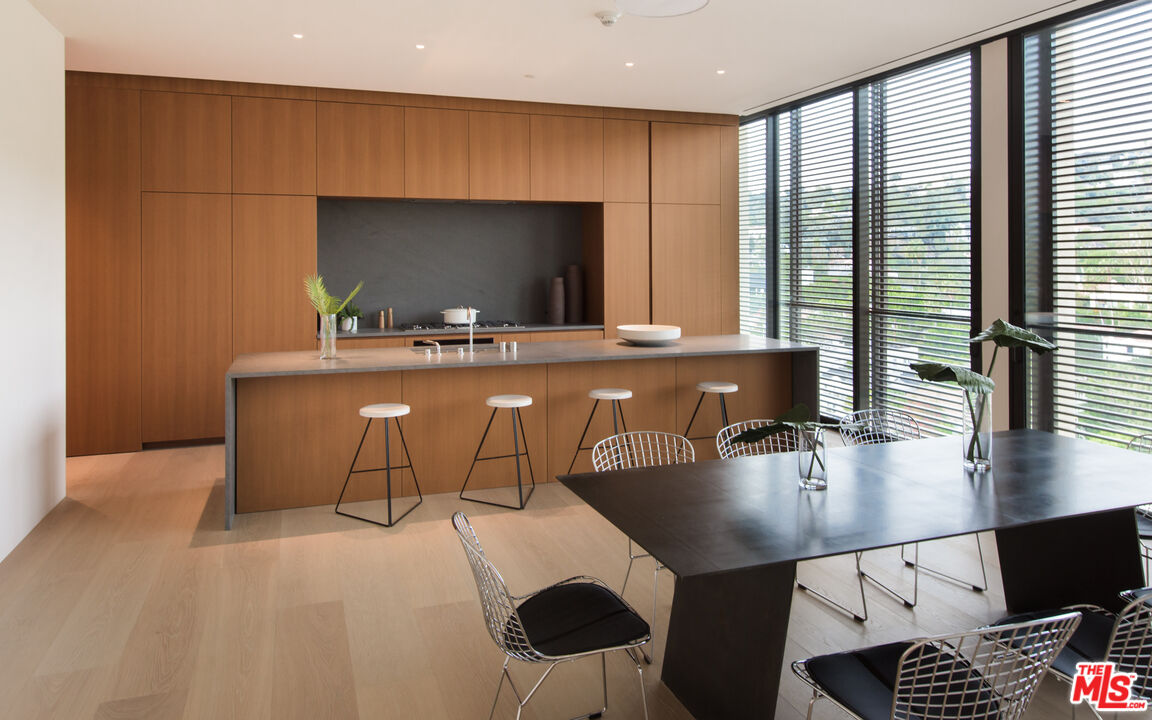 9040 Sunset Boulevard, Unit PHA West Hollywood, CA 90069 - Photo 7 of 30 a living room with furniture and a flat screen tv