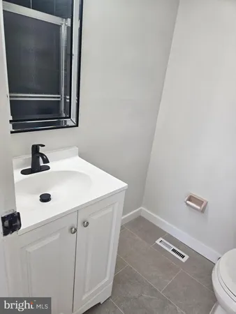 a bathroom with a sink and a toilet