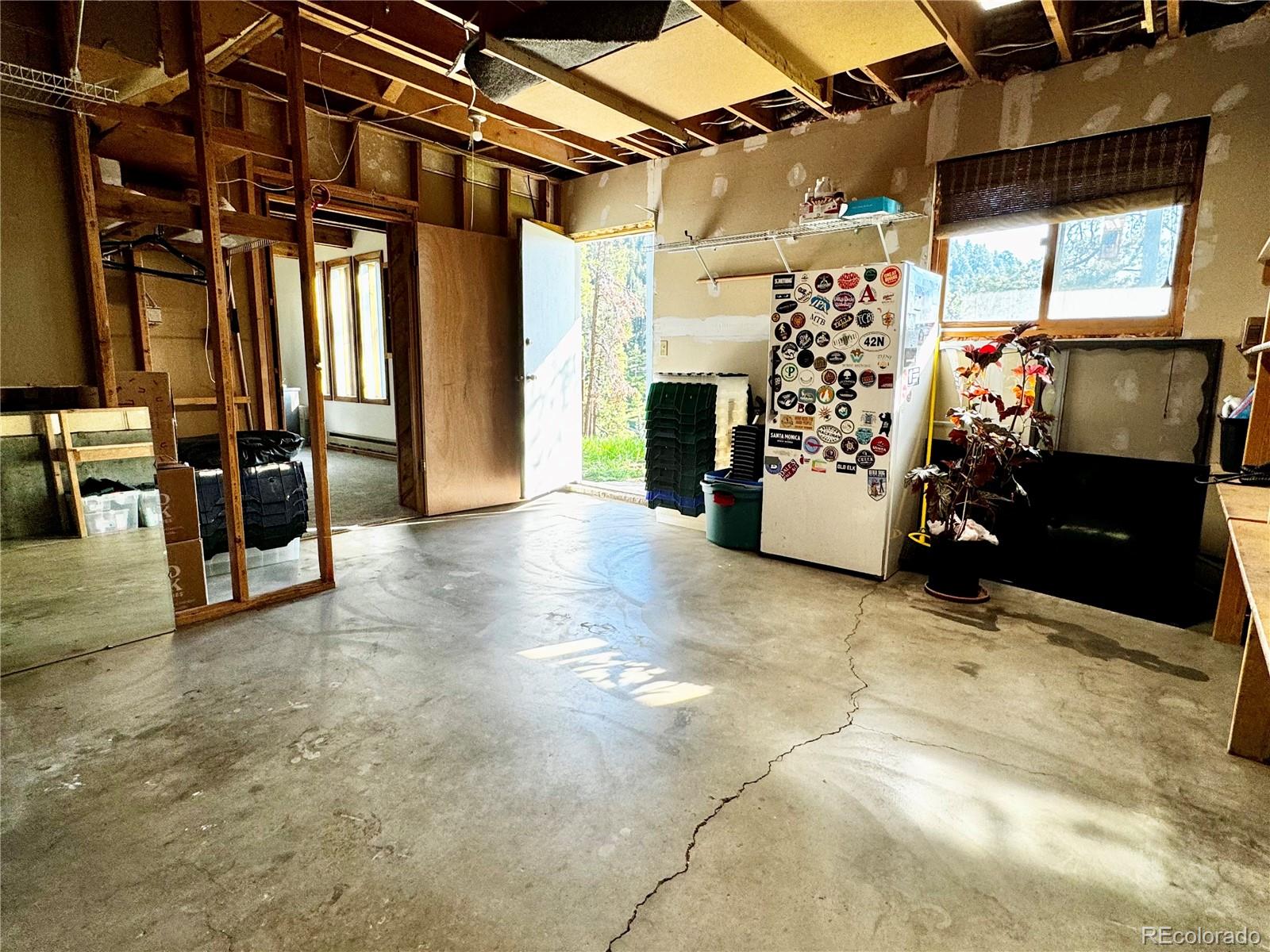 7359 Brook Forest Way Evergreen, CO 80439 - Photo 30 of 40 a view of a storage room with racks on the wall