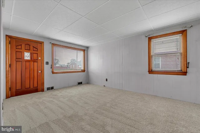 a view of an empty room with a window