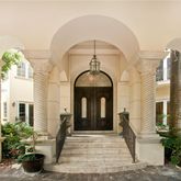 a view of a building with a potted plant