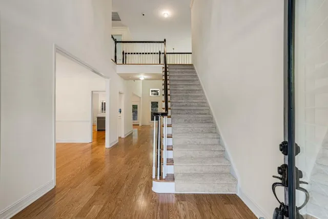 a view of entryway with wooden floor