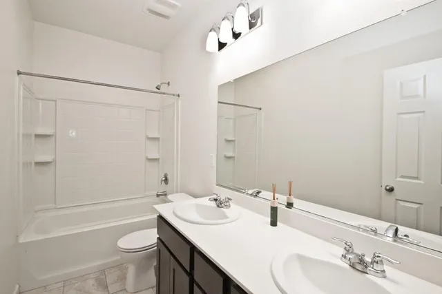 a front view of a house with a glass door