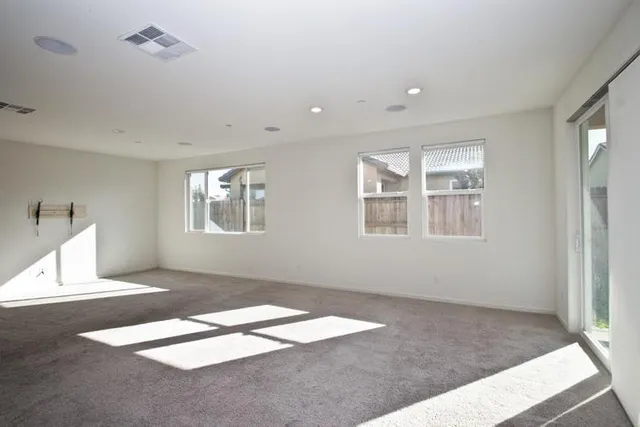 a bathroom with a bathtub a shower a sink and a mirror