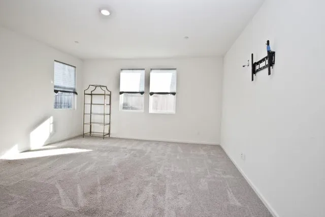 a bathroom with a double vanity sink mirror and