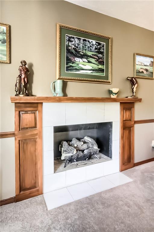 200 Holyoke Road Butler, PA 16001 - Photo 12 of 25 a living room with furniture and a fireplace