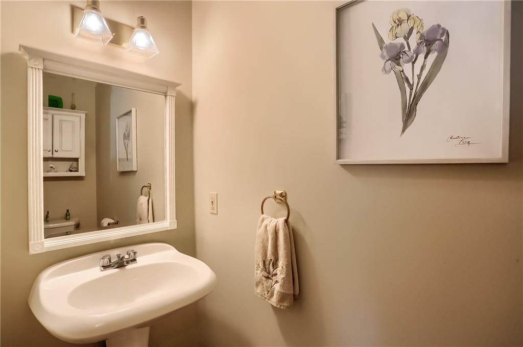 200 Holyoke Road Butler, PA 16001 - Photo 15 of 25 a bathroom with a sink and mirror