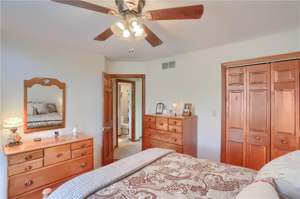 200 Holyoke Road Butler, PA 16001 - Photo 18 of 25 a bedroom with a bed and a dresser in it