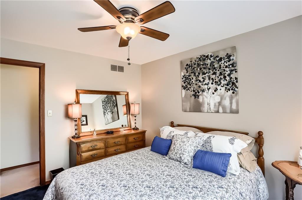 200 Holyoke Road Butler, PA 16001 - Photo 21 of 25 a bedroom with a bed dresser and wooden floor