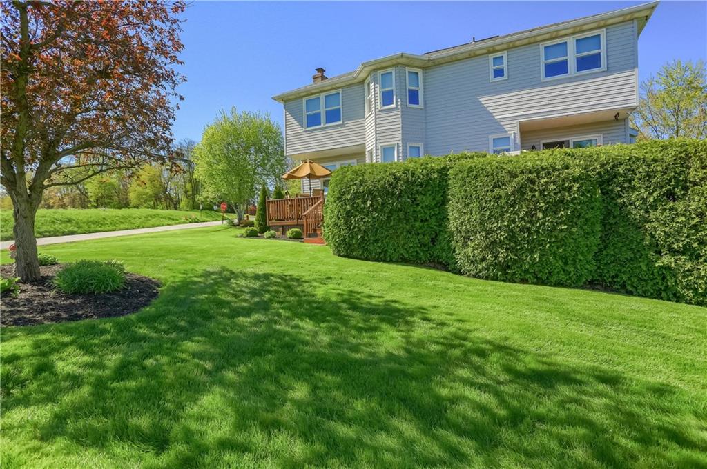 200 Holyoke Road Butler, PA 16001 - Photo 22 of 25 a view of a brick house with a big yard and large trees